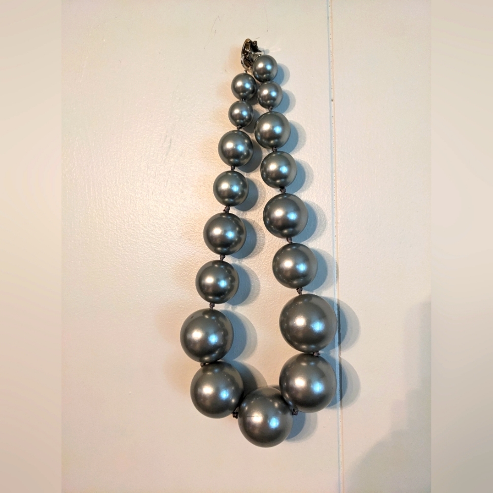 Big silver necklace!